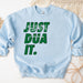 a blue sweatshirt with the words just dua it printed on it