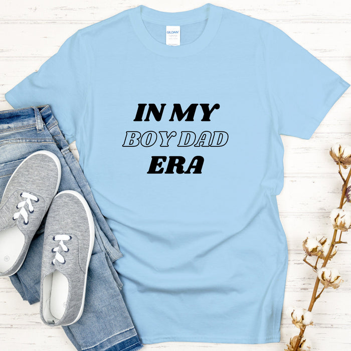 a t - shirt that says in my boyfriend's bra next to a pair