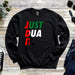 a sweater that says just dua on it
