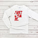 a white shirt that says just do it on it